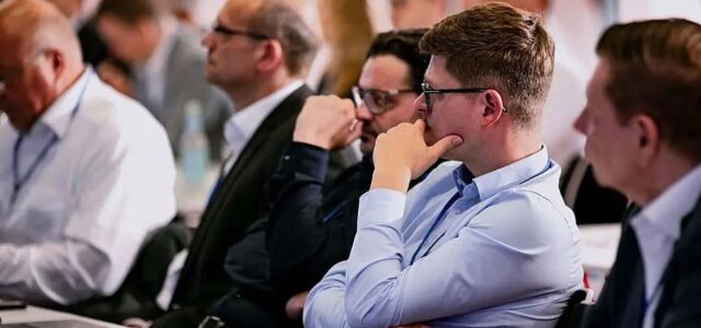 Nahaufnahme Publikum Vortrag